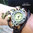 Armbanduhr mit Lederarmband braun und einer Eule als optisches Highlight
